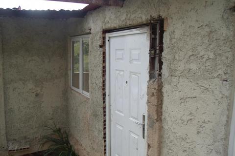 VENDO CASA BARATA POR TERMINAR EN ALBERTO RAVELL,SE SUBEN ESCALERAS